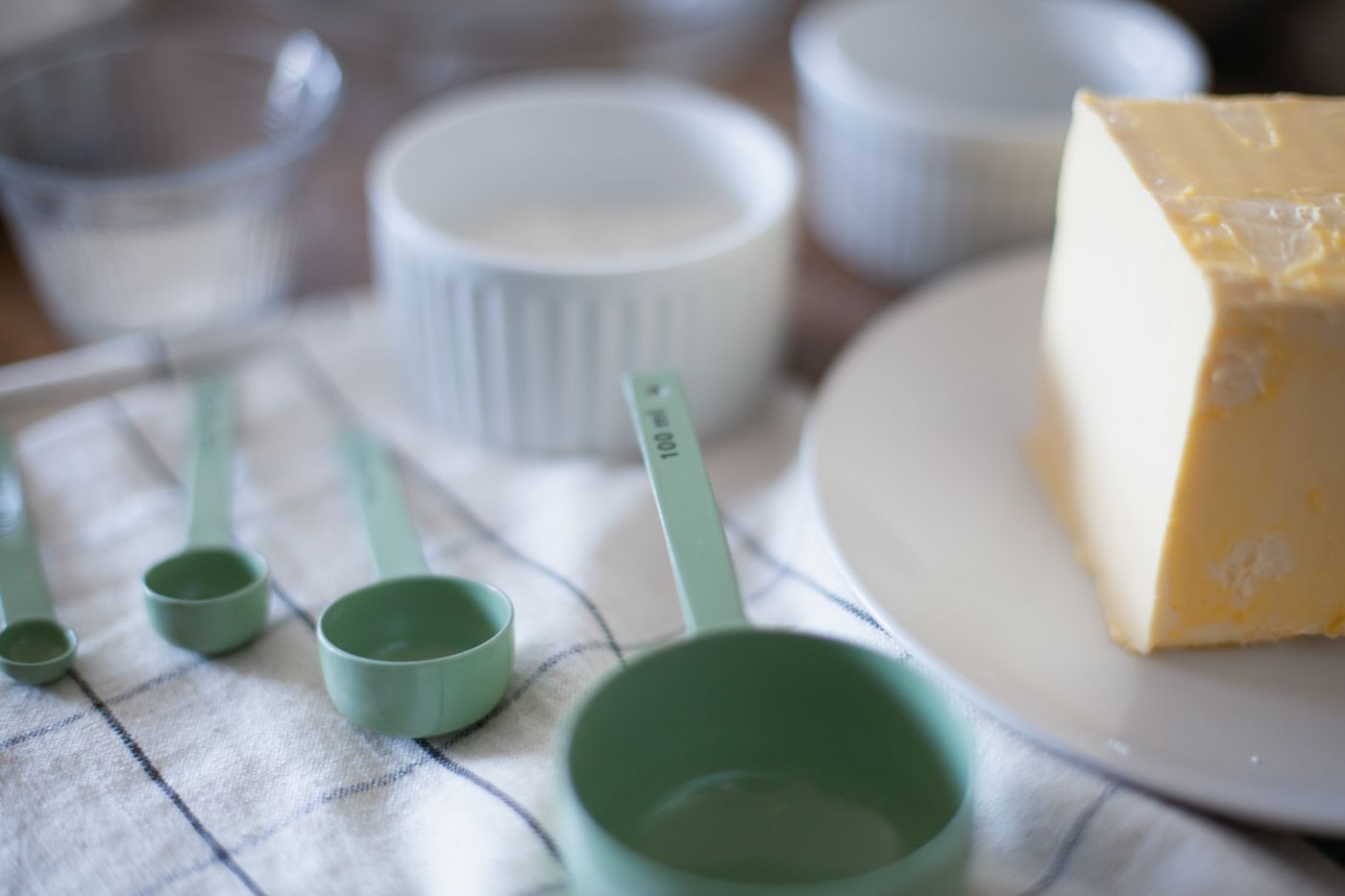 Measuring cups and baking ingredients