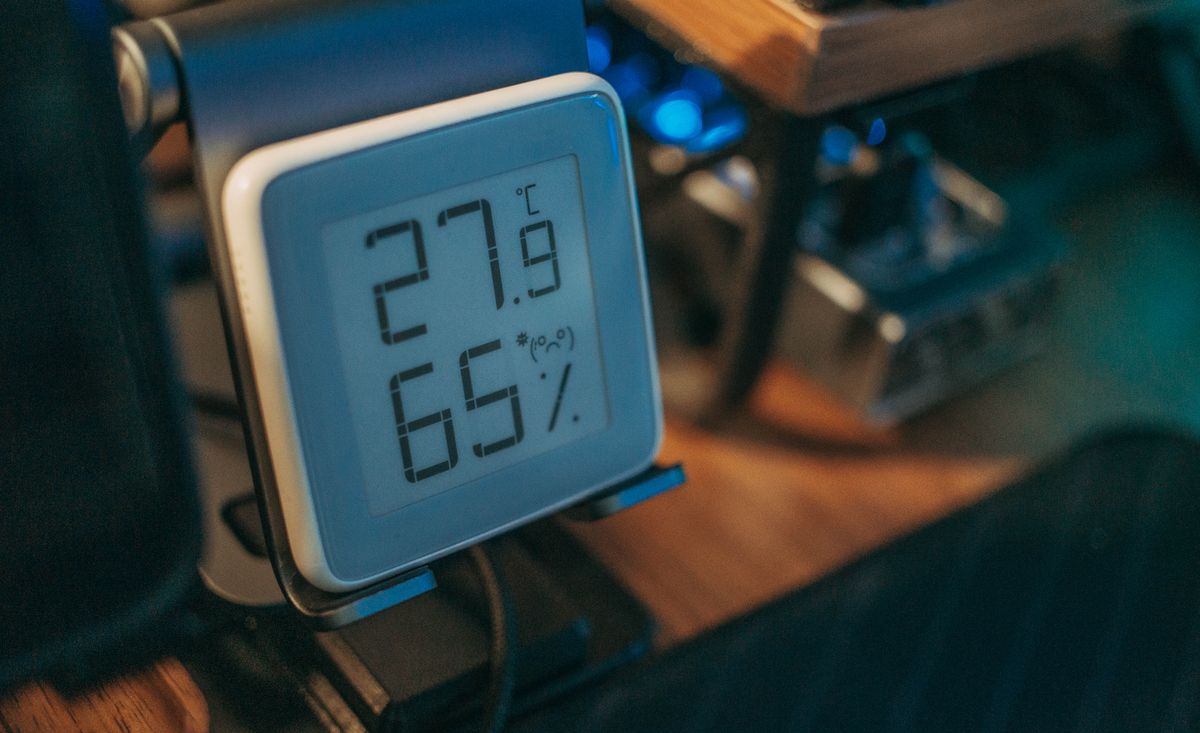 Digital room meter displaying temperature and humidity