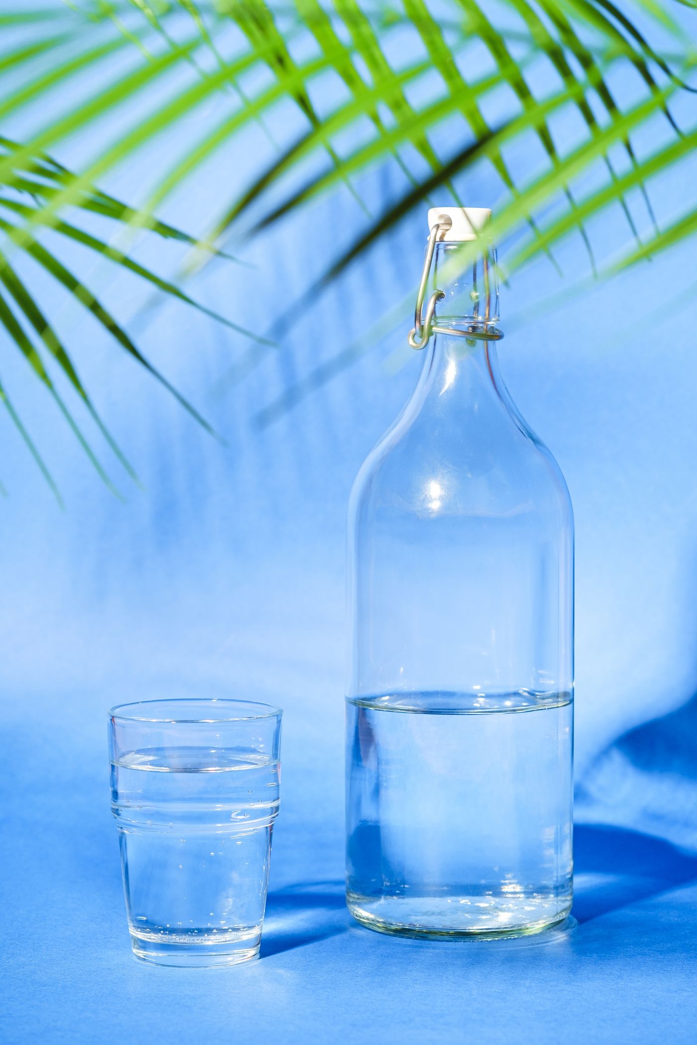 Glass water bottle and drinking glass