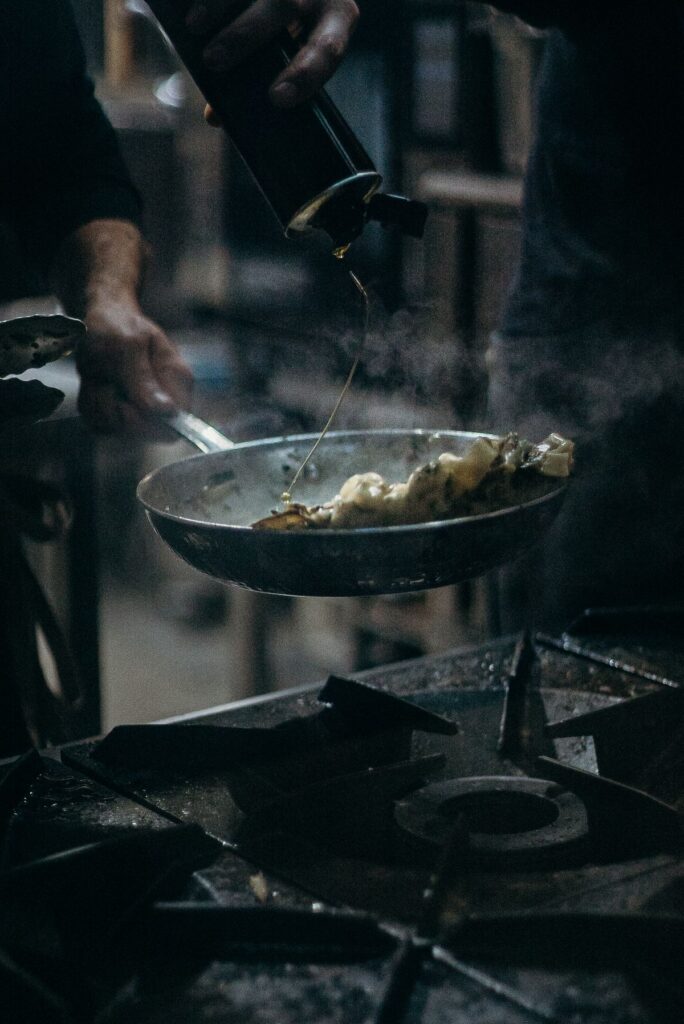 Cook using a frying pan on a stove