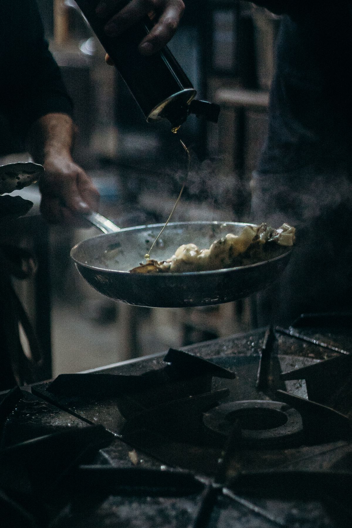 Cook using a frying pan on a stove