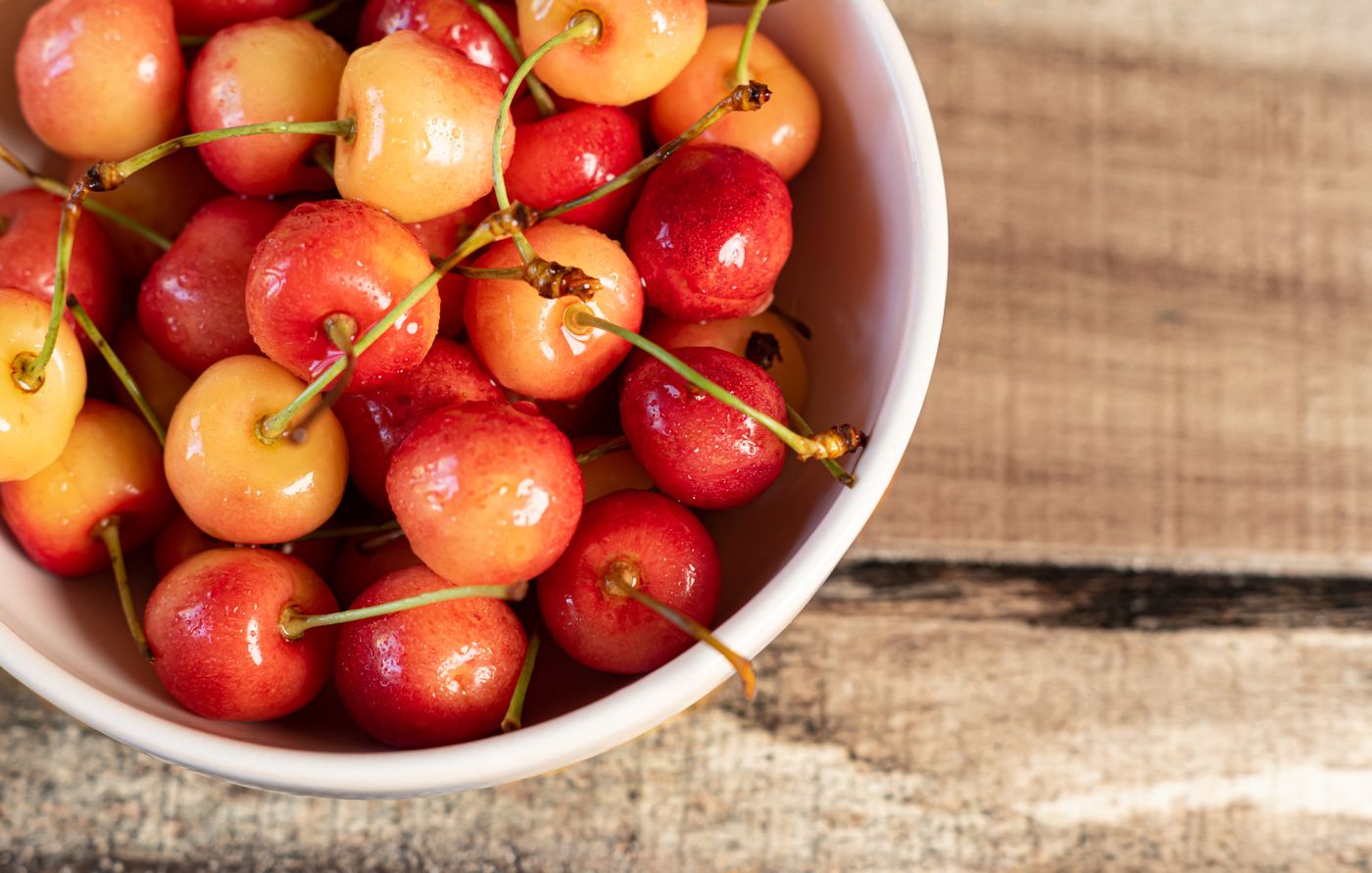 Cherries in a white bowl