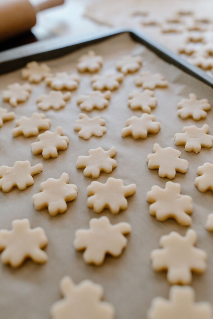Cookie dough portions arranged on a baking sheet