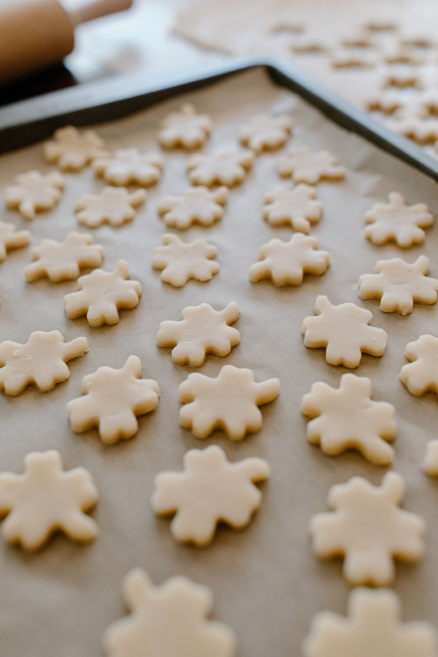 Cookie dough portions on a baking sheet