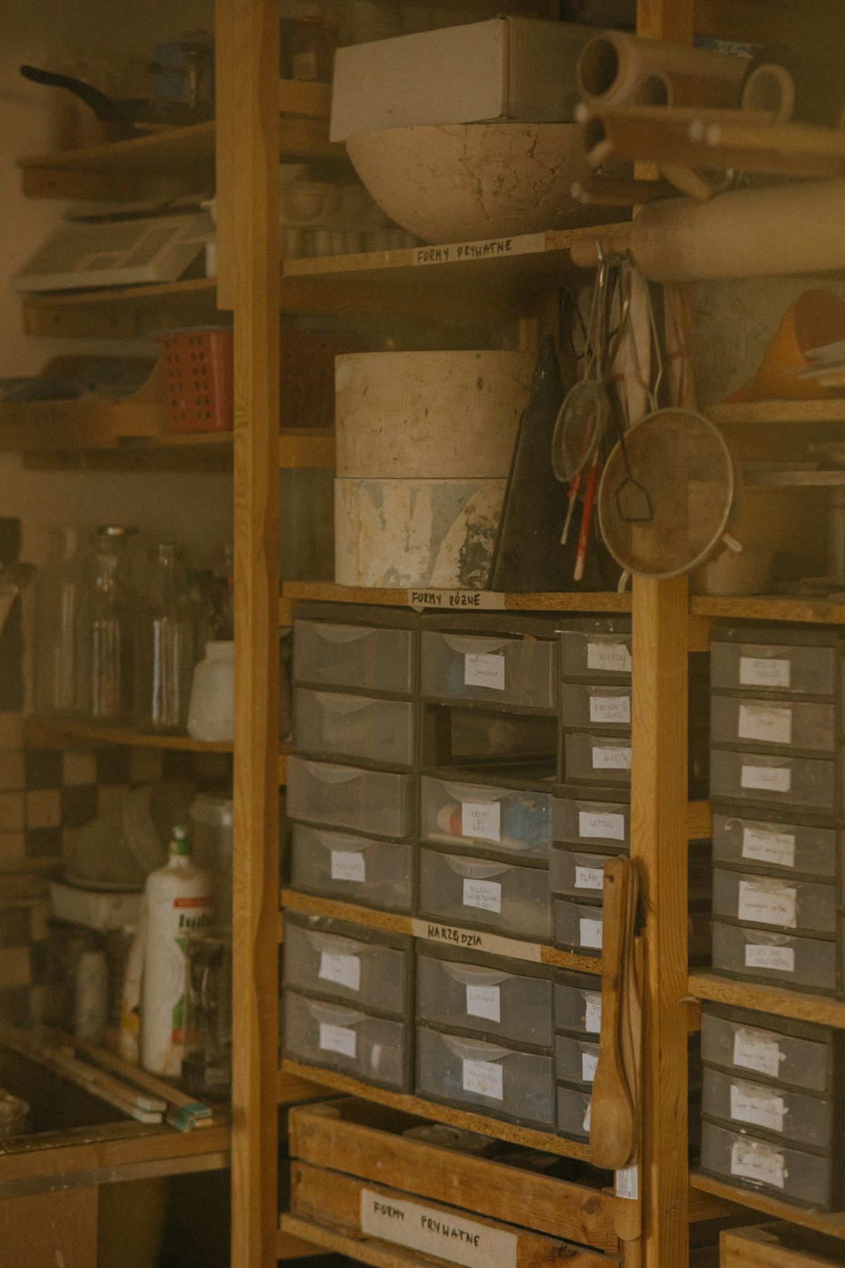 Shelves holding organized household and craft supplies