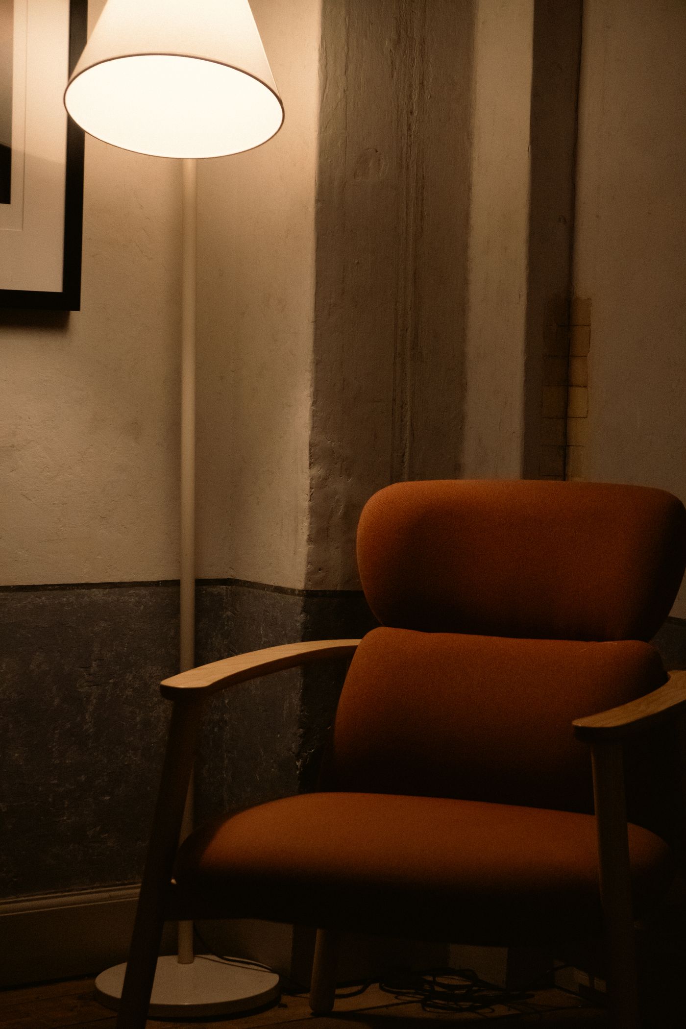 Armchair and lamp in a reading corner