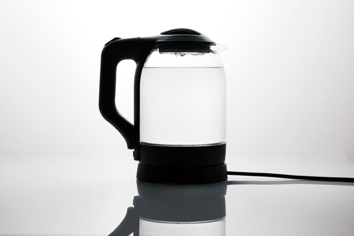 Glass electric kettle containing water