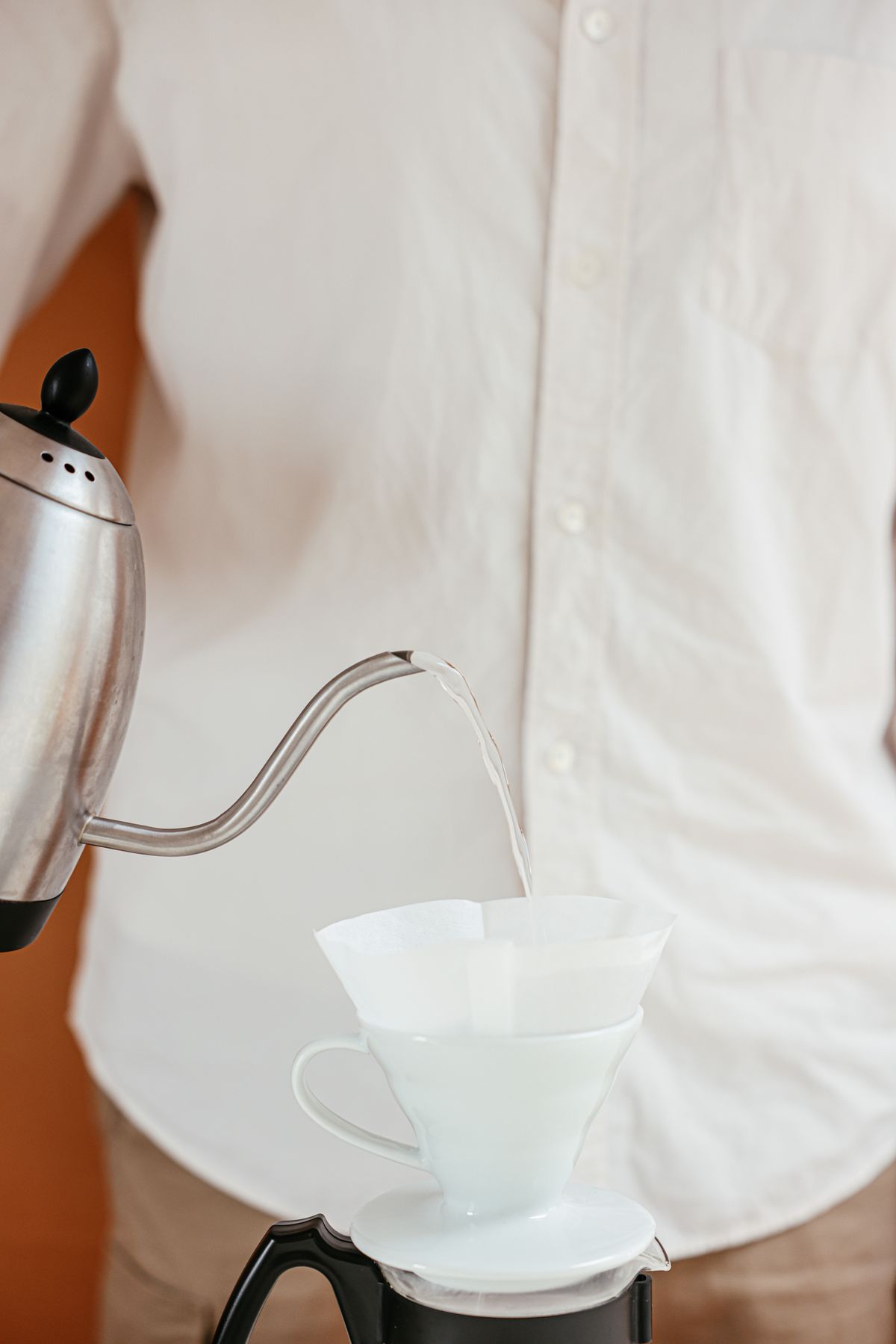 Hot water poured into a manual coffee dripper