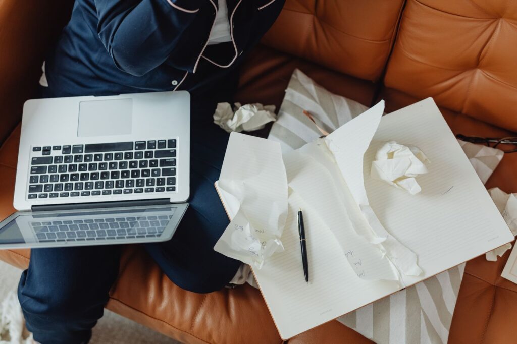 Laptop used while sitting on a sofa