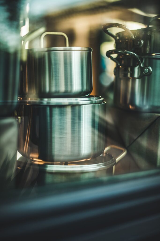 Stacked stainless steel cooking pots