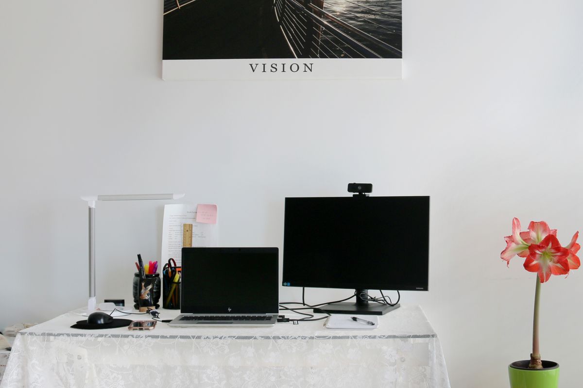 Laptop and monitor in a home workspace