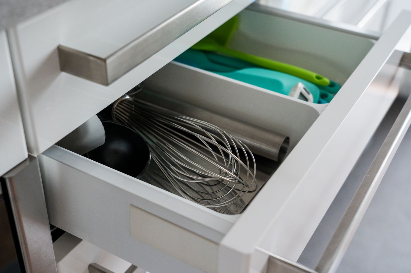 Kitchen utensils arranged in a drawer