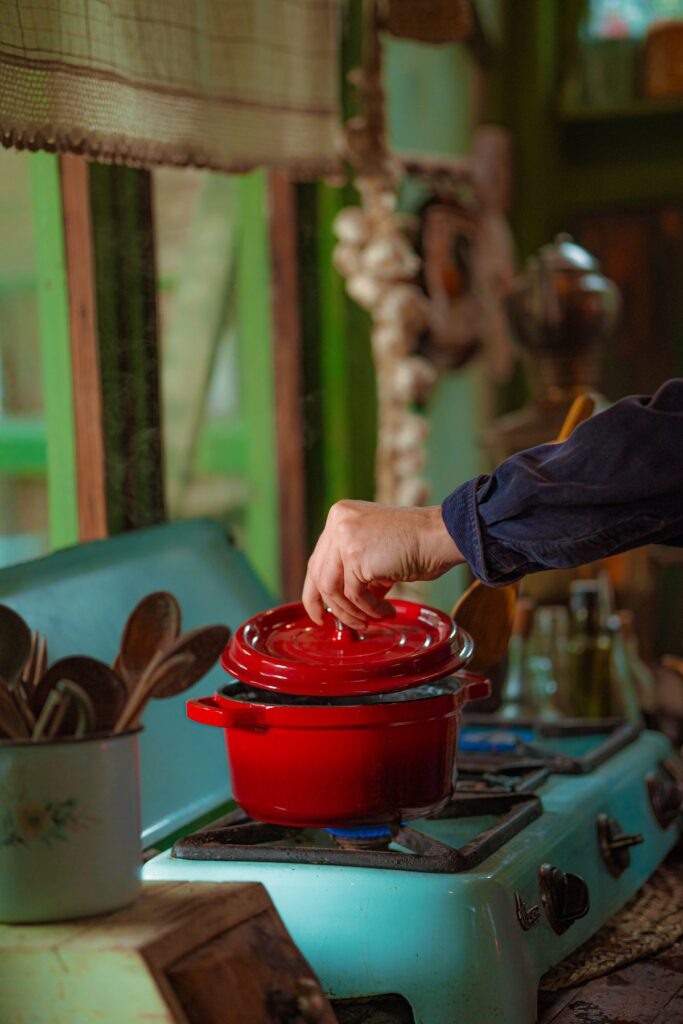 Red cooking pot in a kitchen