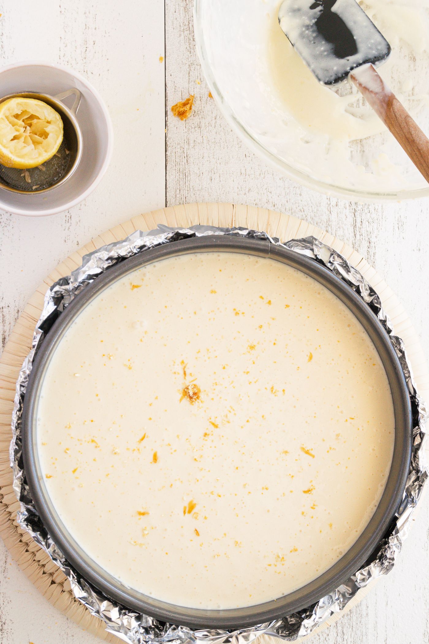 Round baking pan filled with batter