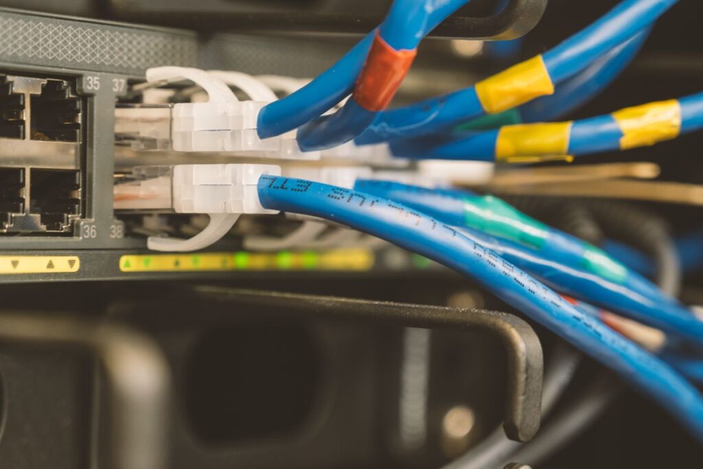 Ethernet cable connected to networking equipment