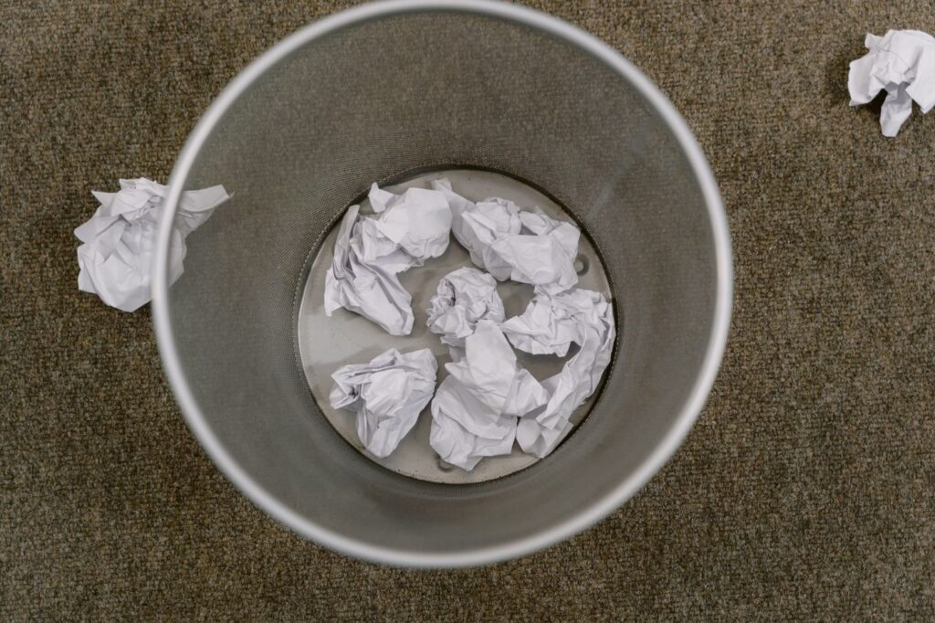 Paper waste inside a small office bin