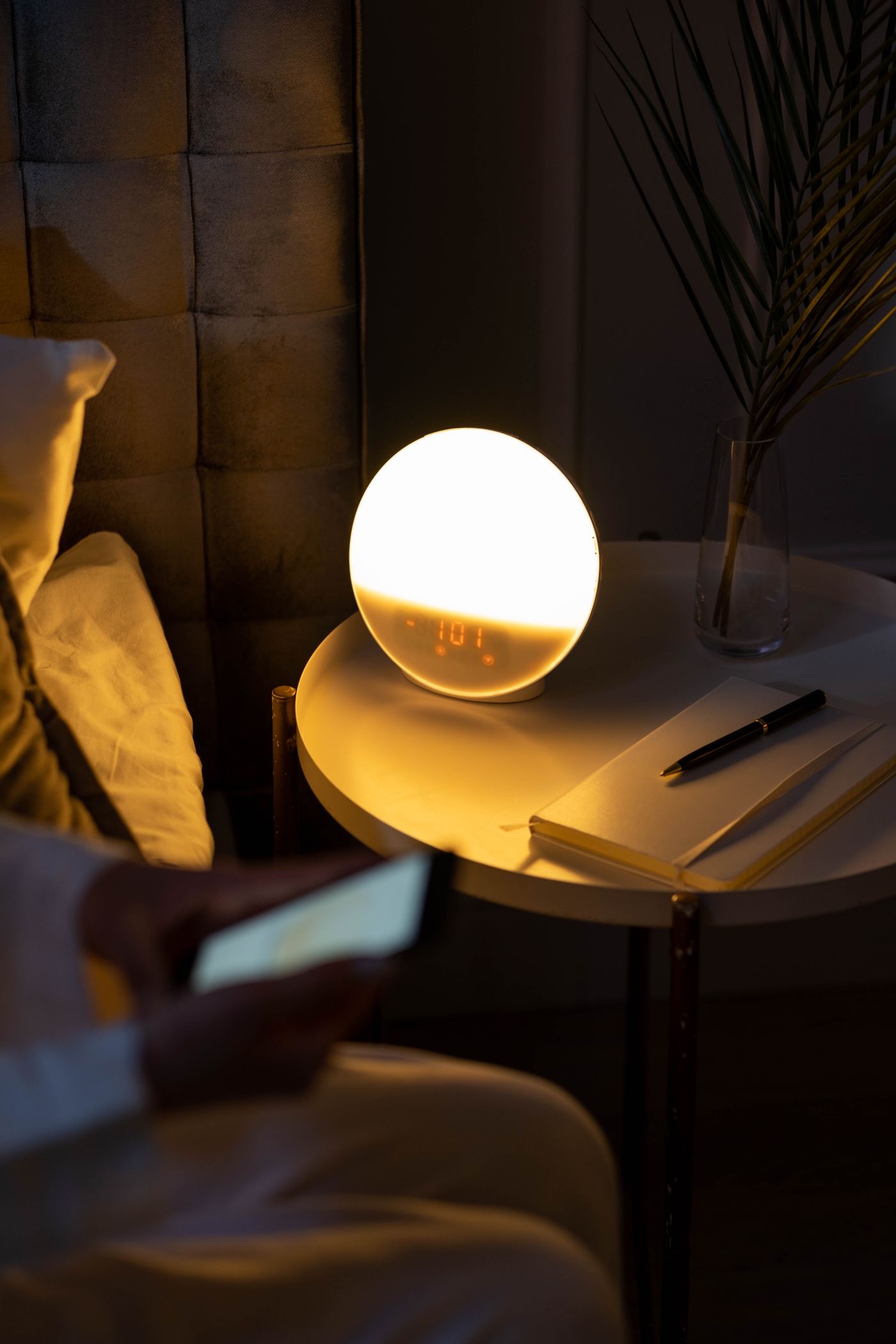 Alarm clock on a bedside table