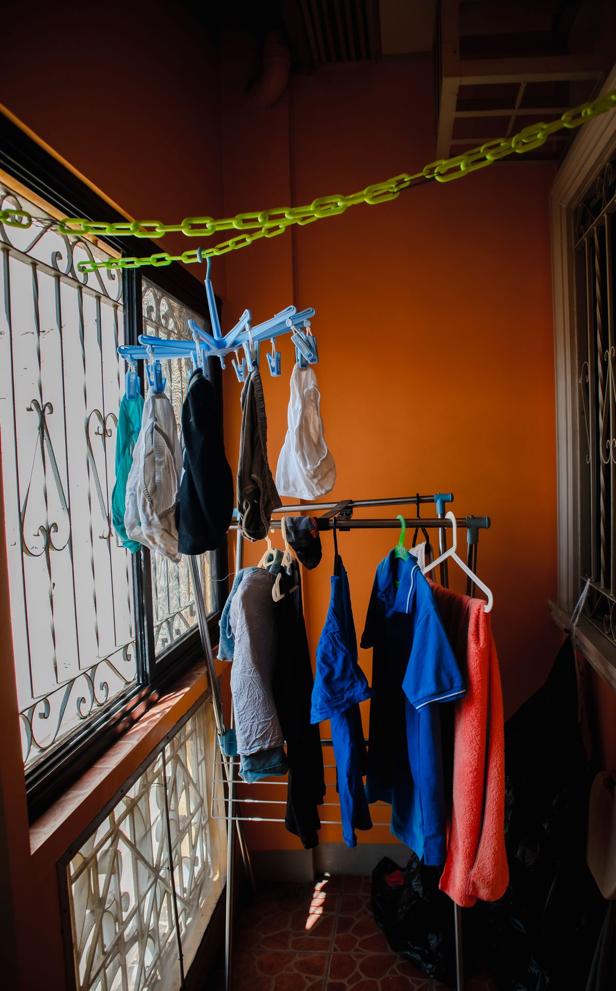 Clothes hanging to dry indoors